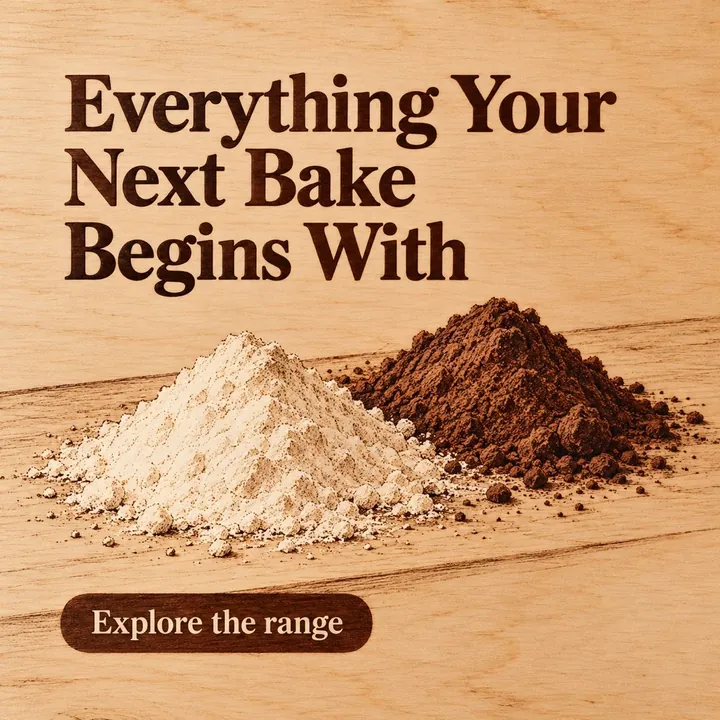 A sample design for a made-up baking-ingredient business: flour and cocoa powder on a wooden board, with the headline Everything Your Next Bake Begins With